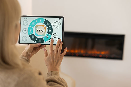 holding-digital-tablet-in-cozy-living-room-with-fi